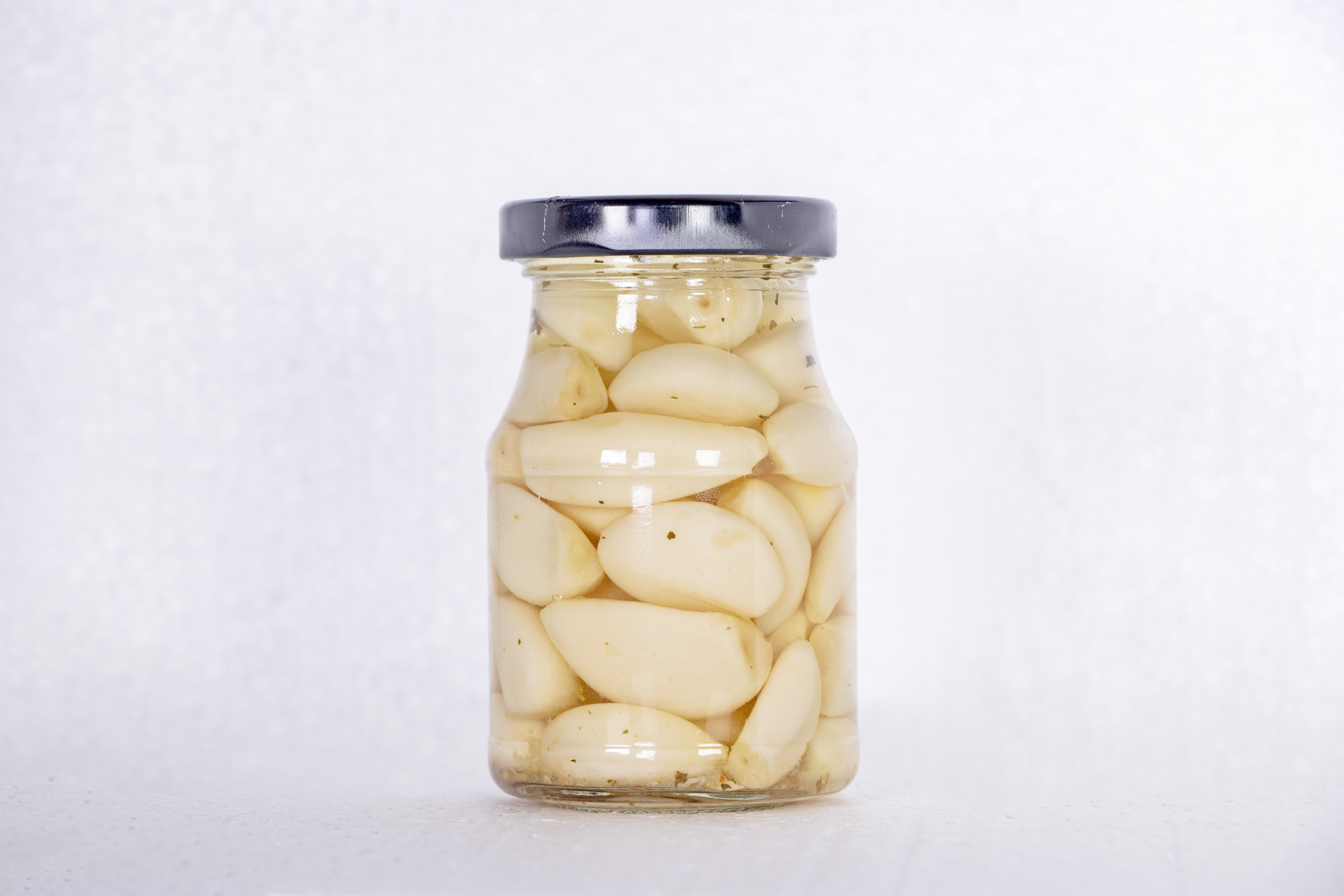 GARLIC CLOVES WITH HERBS